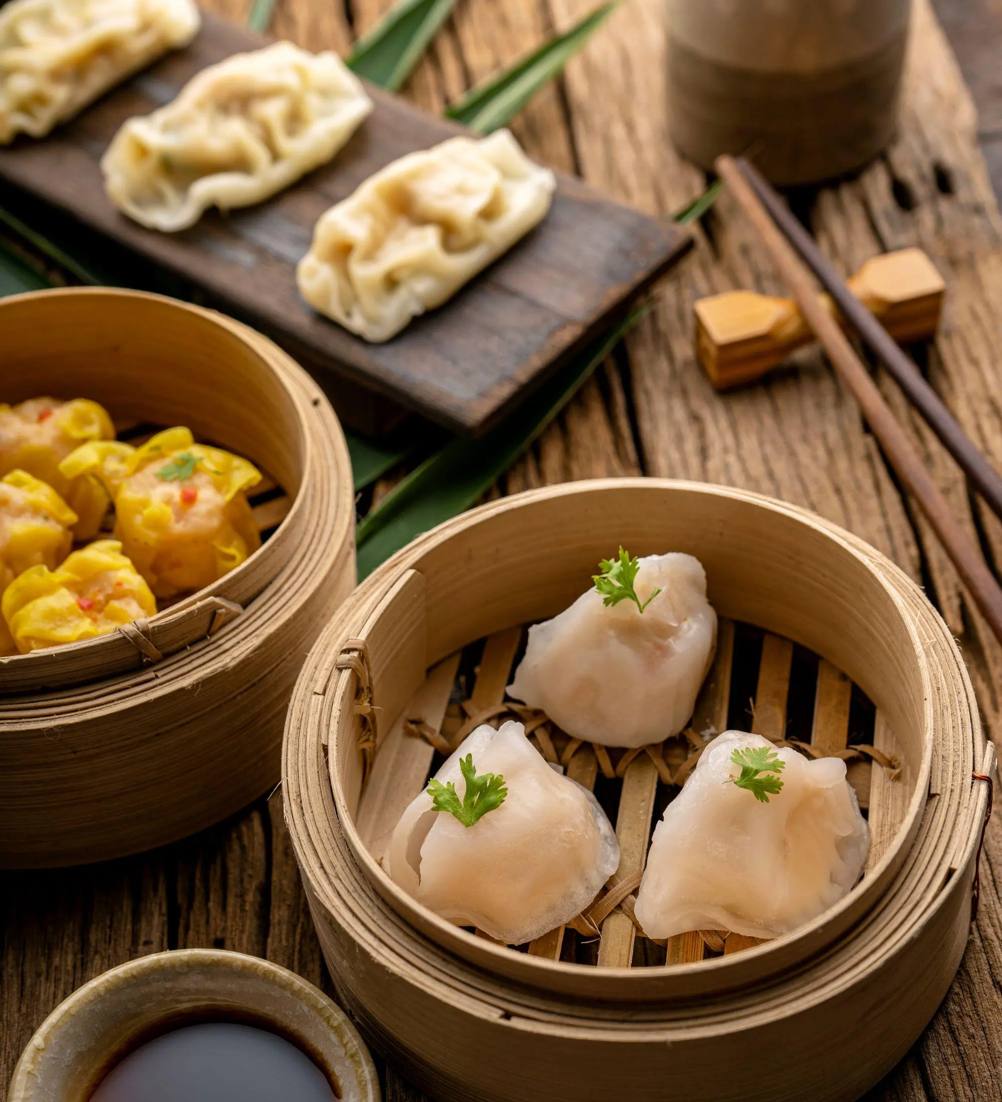 NEW-Golden-Lotus-Chinese-Restaurant-Dim-Sum-Platter-Orlando Dim Sum Platter - Assorted steamed dim sum including shrimp dumplings, pork dumplings, and siu mai, served with soy sauce at NEW Golden Lotus Chinese Restaurant in Orlando